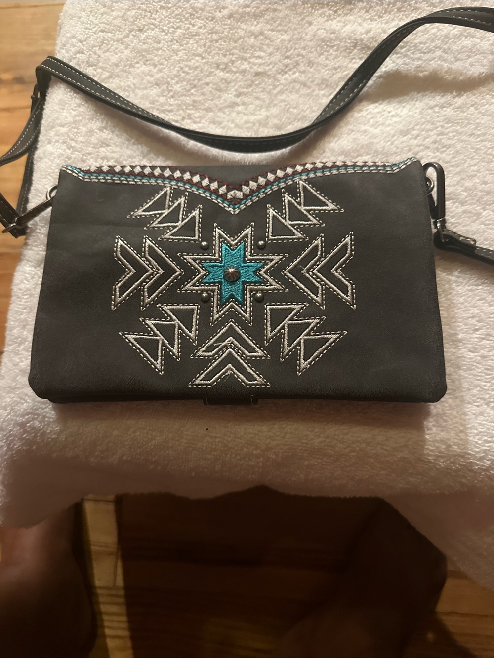 Embroidered Black Crossbody Bag with Turquoise Star Accent
